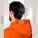 Unisex mikina s kapucí Drummer 2.0 - stsu168-brightorange_studio_lifestyle_detail_front - variant Eg STSU168C0131L