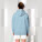 Unisex mikina s kapucí Drummer 2.0 - stsu168-skyblue_studio_lifestyle_main_back - variant Eg STSU168C2321L
