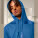 Unisex mikina s kapucí Cruiser 2.0 - stsu177-mindfulblue_studio_lifestyle_detail_front - variant Eg STSU177C7291L