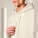 Unisexová mikina s kapucí s volným raglánem Striker - stsu202-naturalraw_studio_lifestyle_detail_front - variant Eg STSU202C0541L