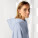 Unisexová volnočasová mikina s kapucí Slammer - stsu856-sereneblue_studio_lifestyle_detail_front - variant Eg STSU856C0571M