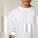 Unisexové tričko Blaster 2.0 s vysokým golierom a nadrozmernými rozmermi - sttu959-white_studio_lifestyle_detail_front - variant Eg STTU959C0011L