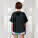 Stella Collider dámské tričko s ohrnutým rukávem - sttw089-black_studio_lifestyle_main_back - variant Eg STTW089C0021L