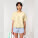 Stella Collider dámské tričko s ohrnutým rukávem - sttw089-butter_studio_lifestyle_main_front - variant Eg STTW089C0781L