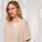 Stella Collider dámské tričko s ohrnutým rukávem - sttw089-heatherrainbow_studio_lifestyle_detail_front - variant Eg STTW089C0841L