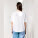 Stella Collider dámské tričko s ohrnutým rukávem - sttw089-white_studio_lifestyle_main_back - variant Eg STTW089C0011L