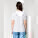 Stella Serena dámské tričko s hlubokým výstřihem - sttw173-white_studio_lifestyle_main_back - variant Eg STTW173C0011L