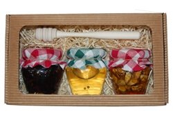 Sada med, oříšky a sušené ovoce v medu s meduňkou v krabici z vlnité lepenky